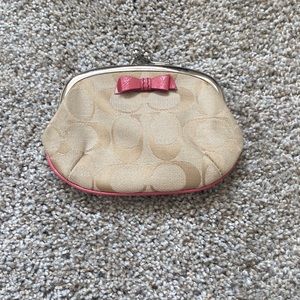 Coach change purse with coral bow